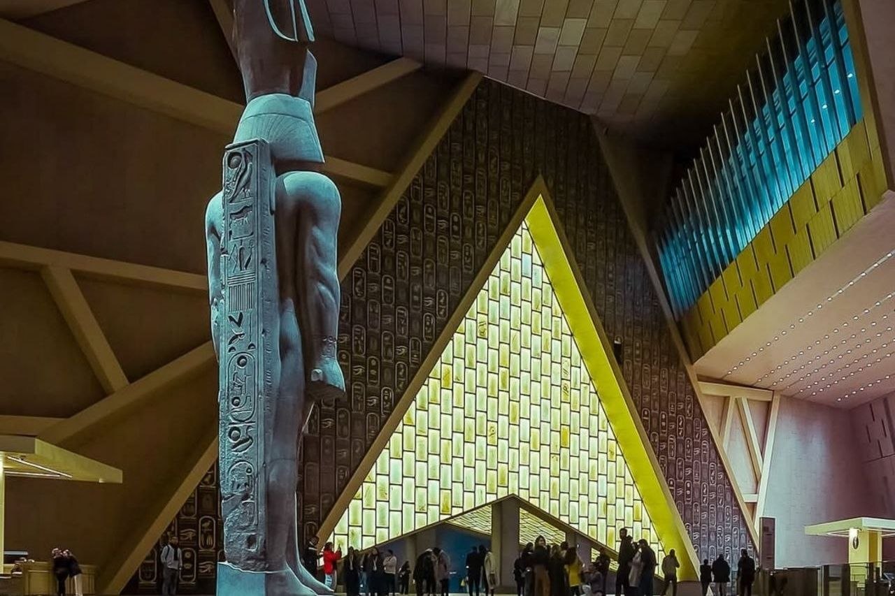 Grand Egyptian Museum near Pyramids of Giza main hall statues ancient Egypt artifacts Cairo