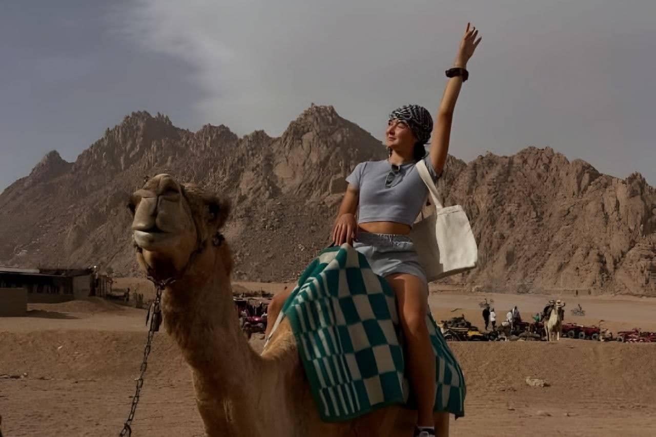 Sunset camel and horse riding experience in Marsa Alam desert with safety support